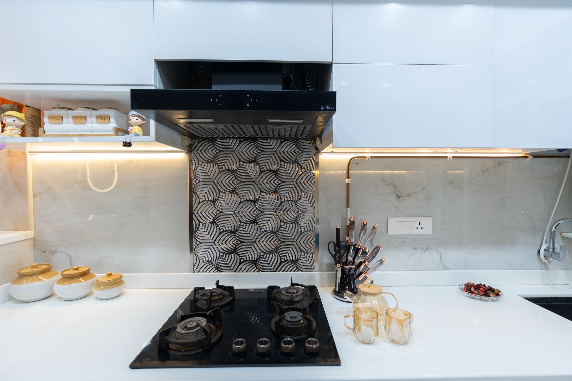 Minimal modular kitchen design with clean finishes by Indus Studio